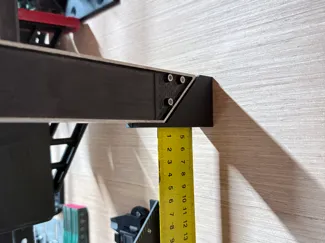 Try square ruler hook / wall mount