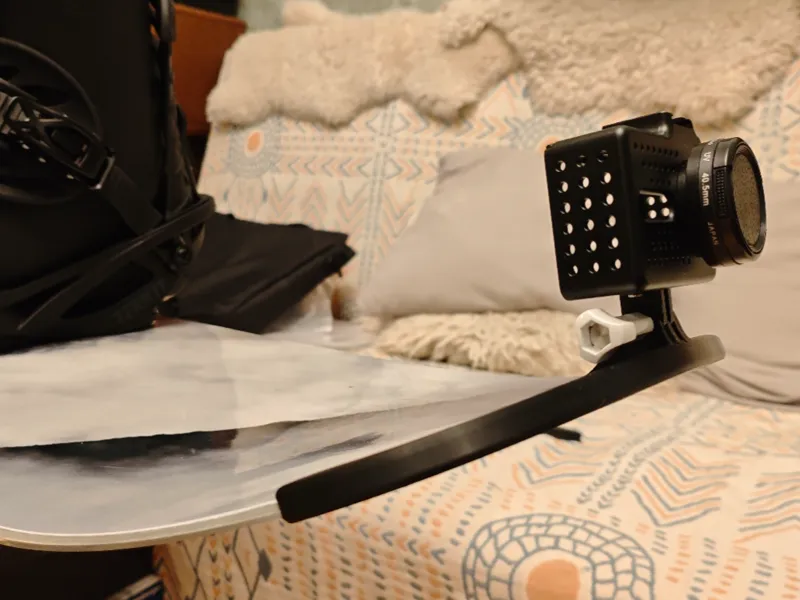 Snowboard bumper with GoPro mount