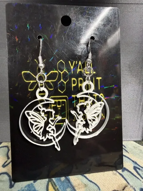 Fine line Fairy in a crescent moon earrings view 3