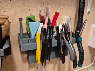 Wall mounted tool holder