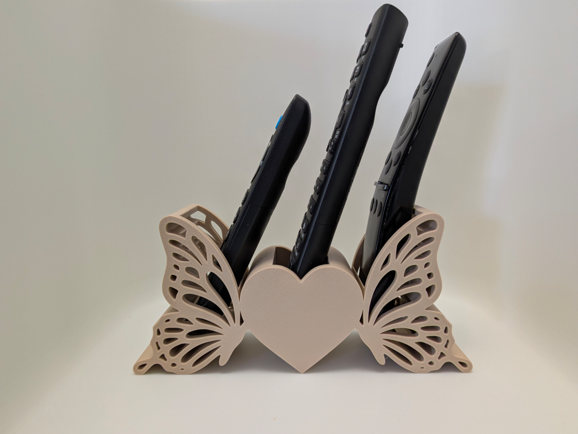 Remote control holder with butterflies and heart