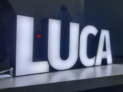 Illuminated sign with the name Luca