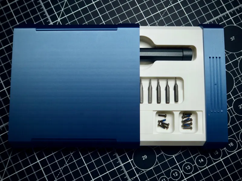 Sliding screw box with magnets and bits holders
