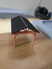 Split the roof in 2 so it didn't need supports.