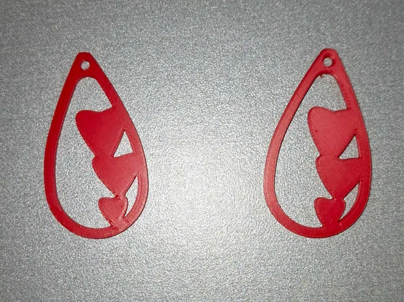 Boucle d'oreille coeur triple