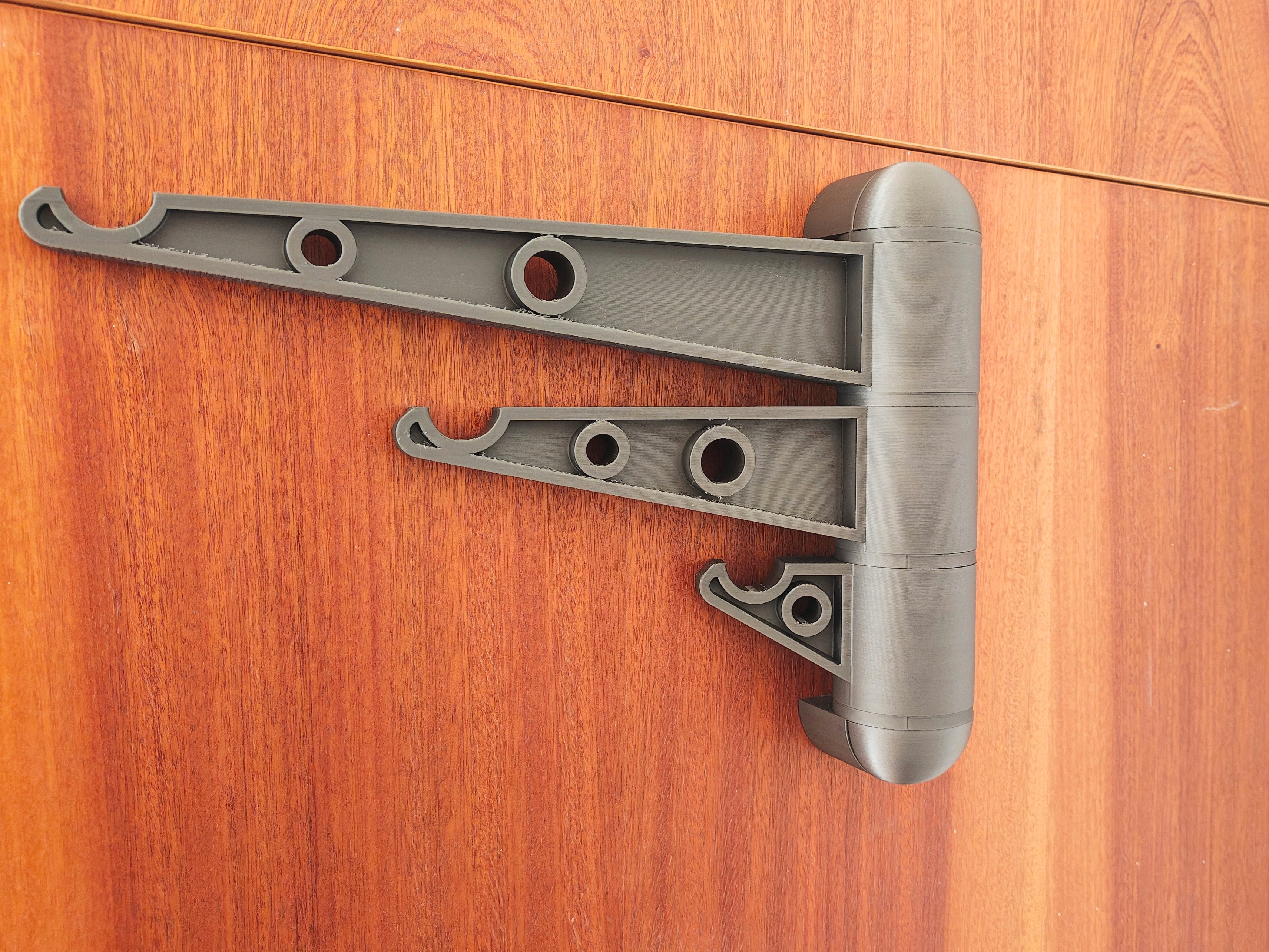 Miniatura 1 do modelo 3D Wall-mounted Tiltable Hook & Hanger