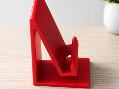 Phone stand with charger cutout