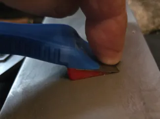 Wedge with nuts for "The perfect bed scraper"