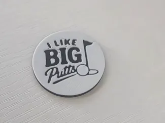 I like BIG Putts golf ball marker