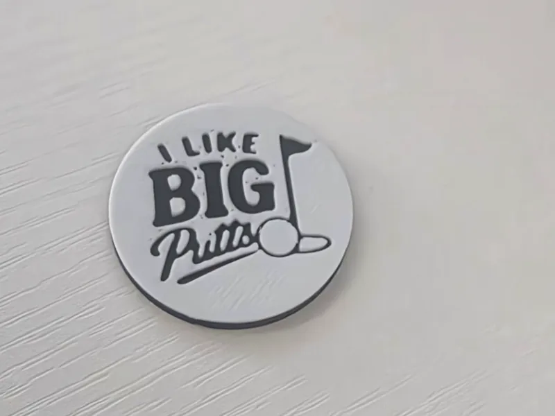 I like BIG Putts golf ball marker