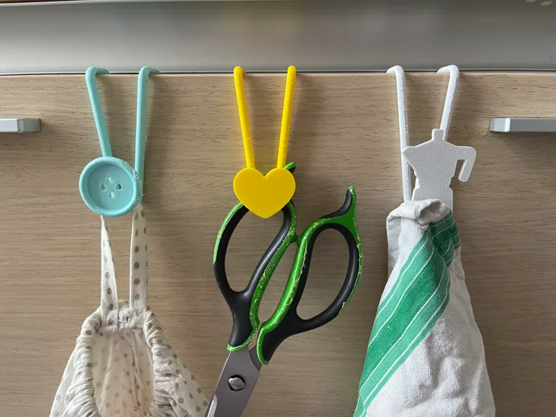 Ganci per armadietti da cucina 