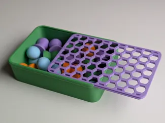 Box with sliding hexagon lid