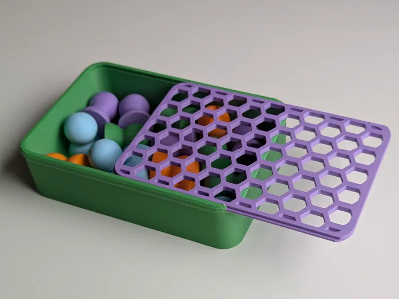 Box with sliding hexagon lid