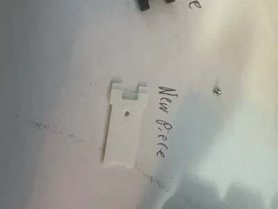 Fujifilm X-Half Battery Door Latch Replacement