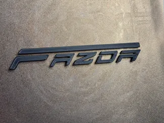 FAZDA the merging of Ford and Mazda logos, made for the Ford Probe / Mazda 626 fans