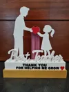 MALE TEACHER WITH GIRL