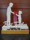 MALE TEACHER WITH BOY