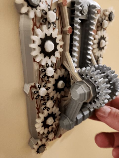 Mechanically Geared Light Switch Cover