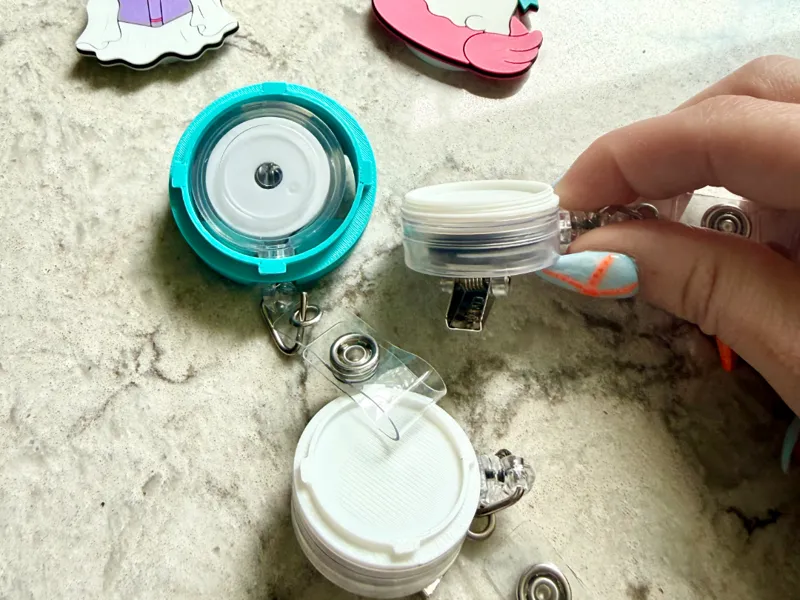 Interchangeable Badge Reel Topper System