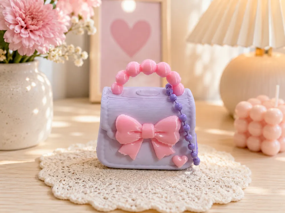 Llavero: Ribbon Heart Bag Charm. Referencia del modelo original.