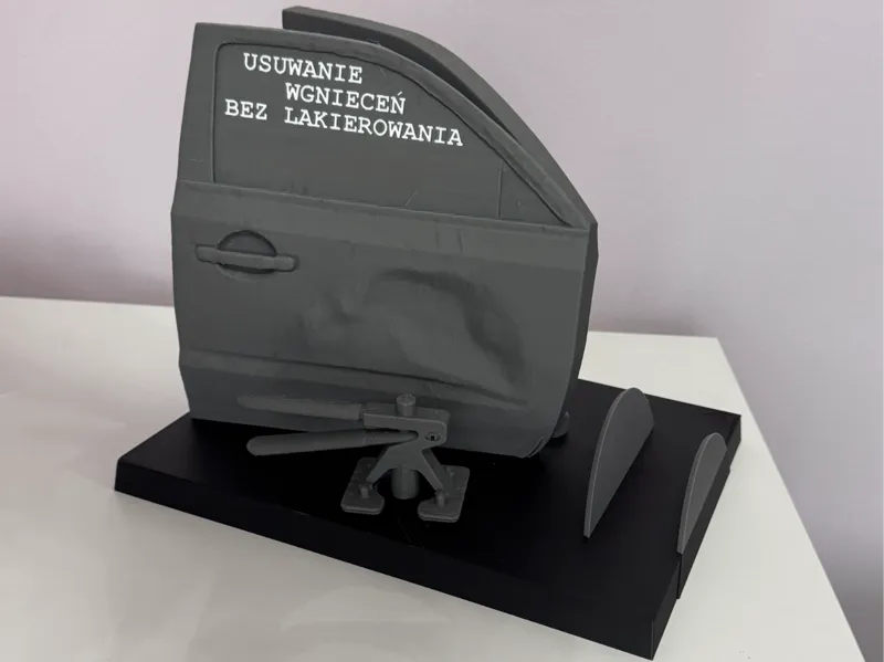 Advertisement for PDR+business card holder