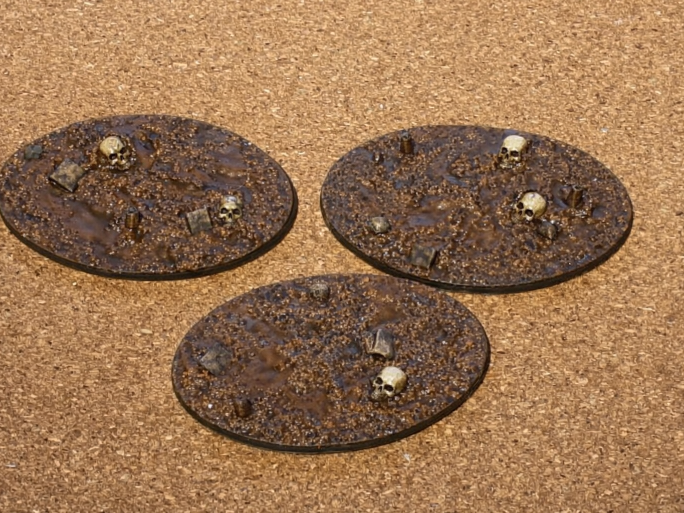 Oval 92x50mm miniature bases - muddy battlefield