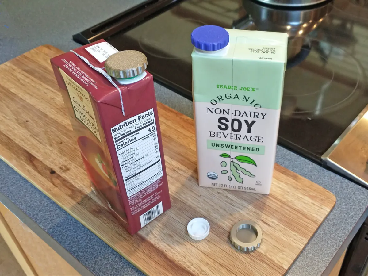 Poignée d'ouverture pour bouchon de brique alimentaire