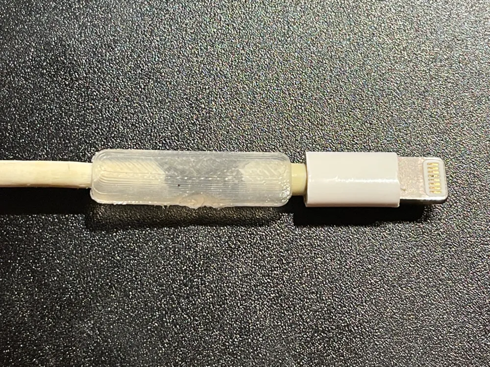 iPhone cable repair hot glue by Lukas K. MakerWorld