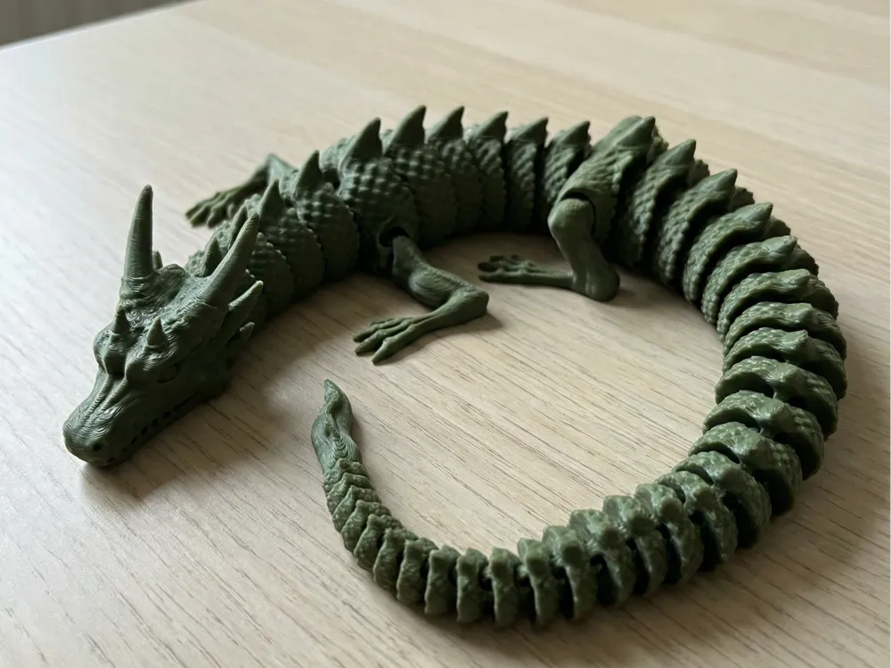 Print-In-Place Articulated Dragon - Free 3D Print Model - MakerWorld