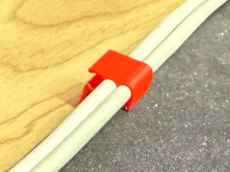Deskmat cable clip