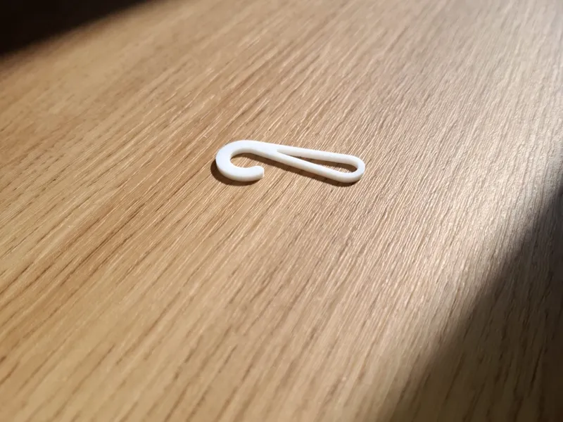 überarbeiteter Haken zum Spannen