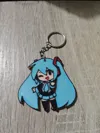Miku keychain and pin