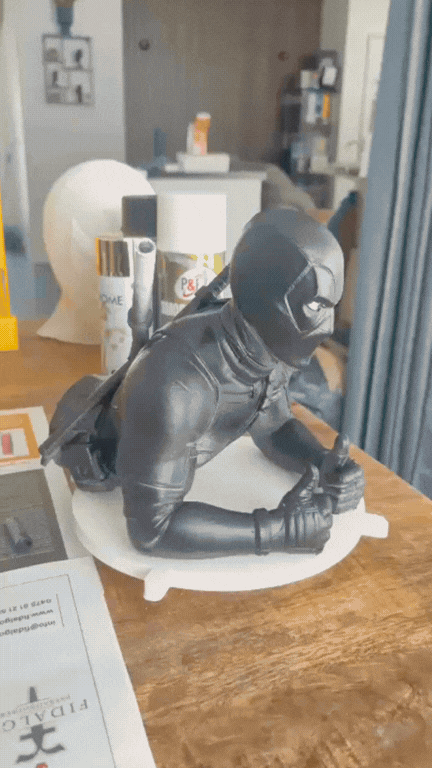 Relaxed Deadpool Giving a Thumbs Up