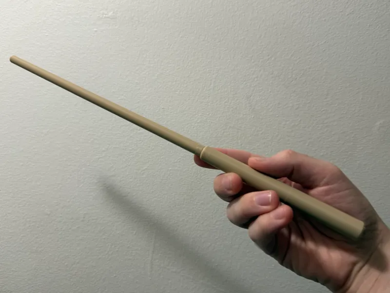Wand with handle compartment