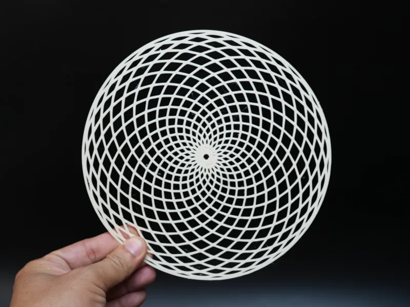 Hypnotic Spiral Mesh Disc Parametric Pattern