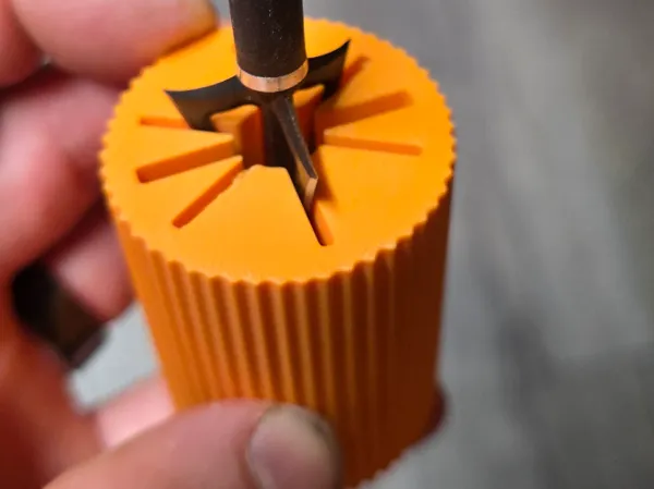 Outil de retrait de pointes de flèche