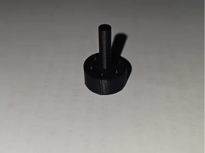 Shower head flow reducer