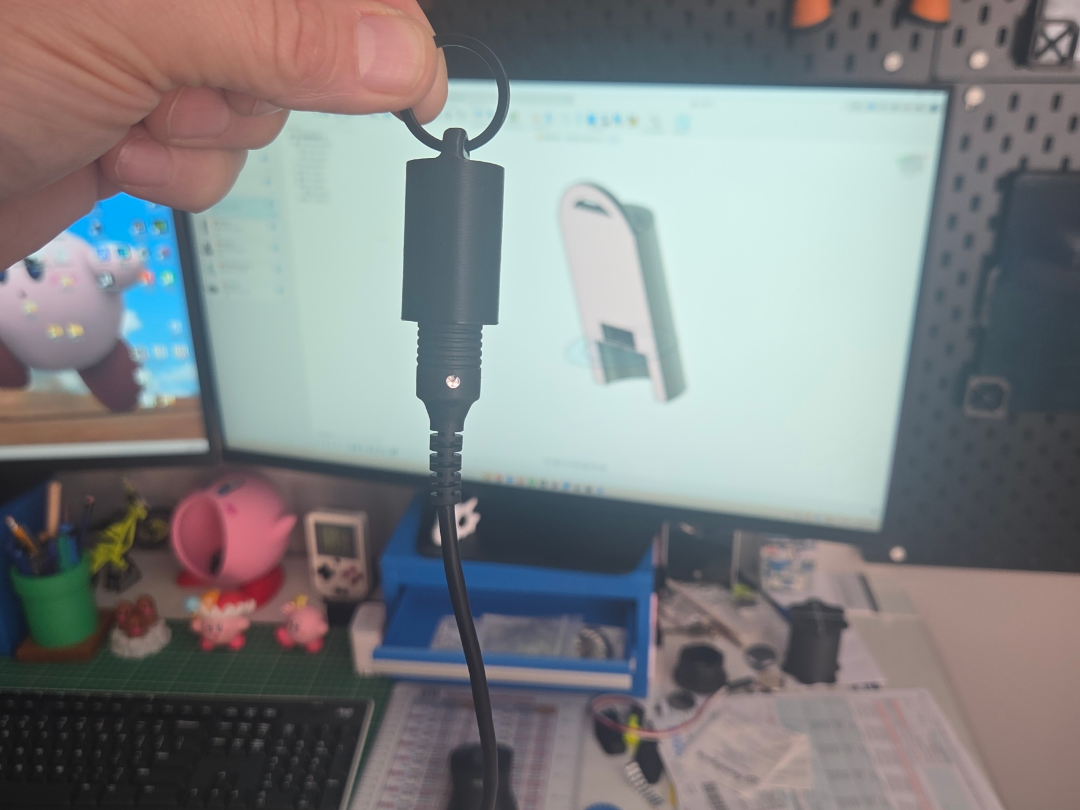 Magnetic holder for magnetic cable (heated visor) 