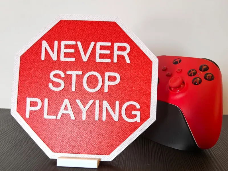 Never stop playing sign