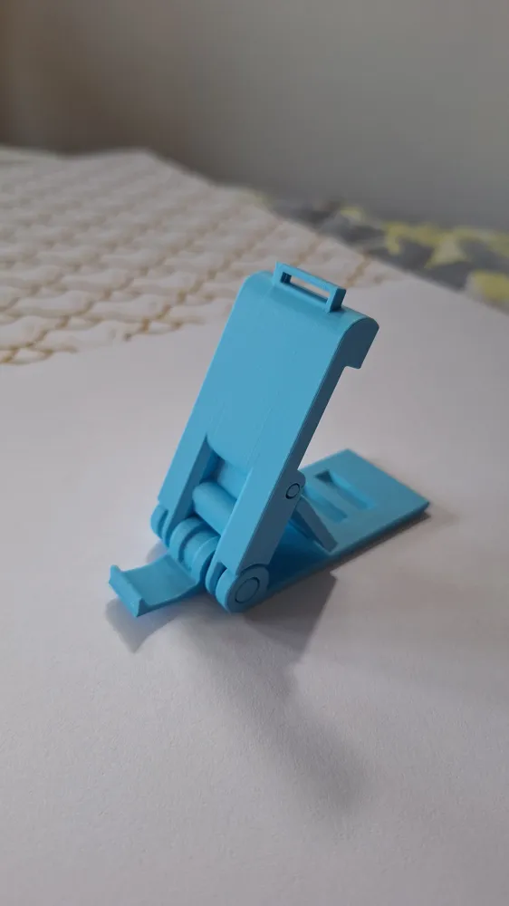 Foldable phone stand - Free 3D Print Model - MakerWorld