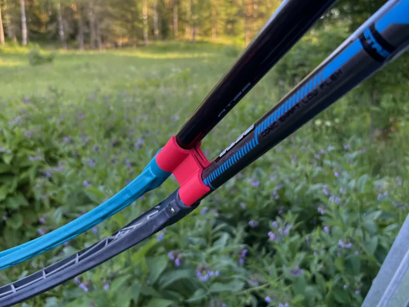 Floorball stick holder