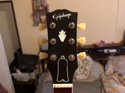 Epiphone - Gibson sized headstock veneer