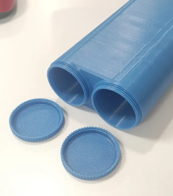 Double tube de rangement à vis