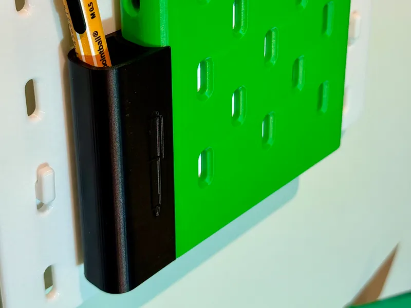 Pen Holder add-on for SKADIS Note Block Holder.