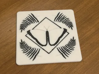 Geometric Butterfly Coaster with Fern Accents