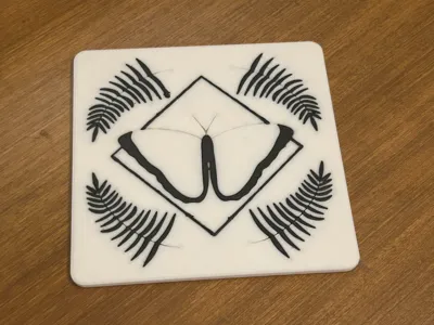 Geometric Butterfly Coaster with Fern Accents