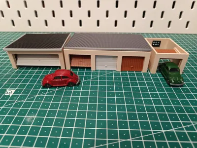 Various Garages with movable doors in H0