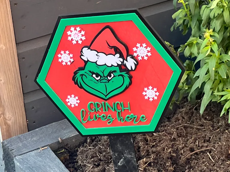Grinch Lives Here sign 
