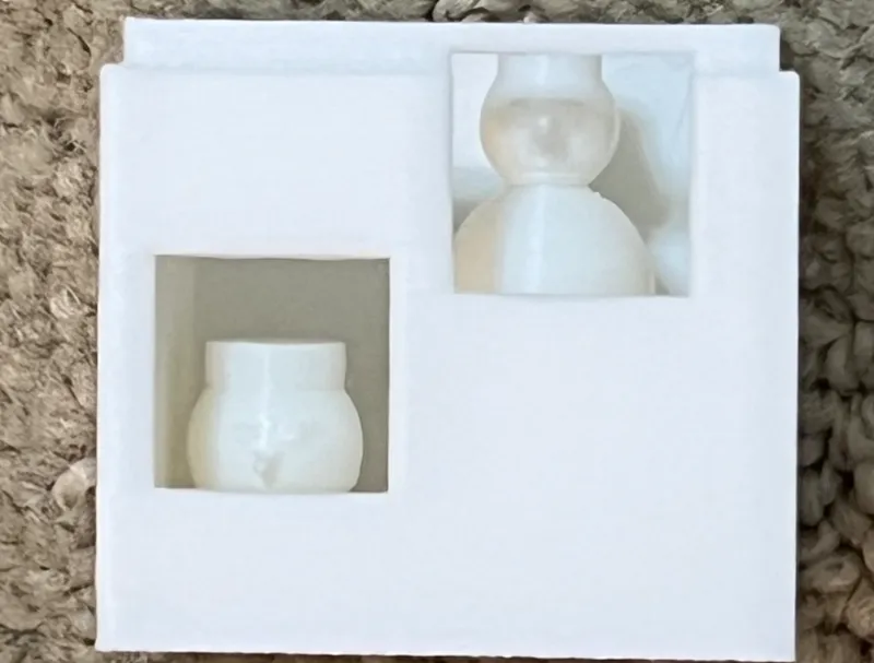 Snowman in a house with a window