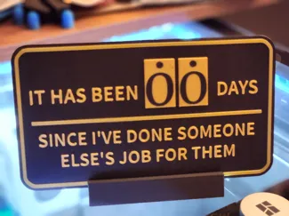 "Someone Else's Job" Sign